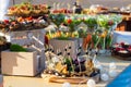 Beautifully decorated catering banquet table with different food snacks and appetizers with sandwich, caviar, fresh fruits on corp Royalty Free Stock Photo