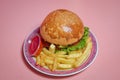 Beautifully decorated catering banquet table with different hamburgers burgers sandwiches on a plate on corporate birthday . Mini Royalty Free Stock Photo