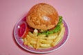 Beautifully decorated catering banquet table with different hamburgers burgers sandwiches on a plate on corporate birthday . Mini Royalty Free Stock Photo