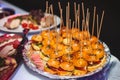 Beautifully decorated catering banquet table with different hamburgers burgers sandwiches on a plate on corporate christmas birthd Royalty Free Stock Photo