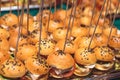 Beautifully decorated catering banquet table with different hamburgers burgers sandwiches on a plate on corporate christmas birthd Royalty Free Stock Photo