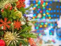 Beautifully decorated Christmas tree against bright and shiny soft focused background. Christmas and New Year concept.