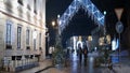 Beautifully decorated city square for New year and Christmas. Action. Walking people and tourists on the decorated Royalty Free Stock Photo