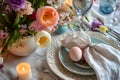 Beautifully decorated Easter dinner table with colorful flowers, pastel crockery and dyed eggs. Indoor Easter celebration party