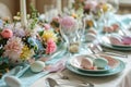 Beautifully decorated Easter dinner table with colorful flowers, pastel crockery and dyed eggs. Indoor Easter celebration party