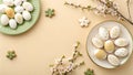 A beautifully decorated Easter table with eggs and flowers on a pastel background Royalty Free Stock Photo