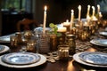 A beautifully decorated Hanukkah table with a menorah, gelt and festive blue and white decorations