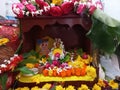 a beautifully decorated house temple in an Indian household