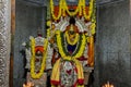 Beautifully decorated idol of Sri Lord Krishna Temple with flowers garlands and lights at Krishna Dhama, Mysuru.KARNATAKA, INDIA