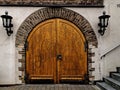 Beautifully decorated portal, door and stone arch