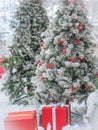 Beautifully decorated Christmas tree against bright and shiny soft focused background. Christmas and New Year concept.