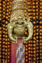 Beautifully designed metallic door handle at Namdroling Monastery, Bylakuppe