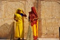 2 beautifully dressed locals in Amber Fort in Jaipur, India. Royalty Free Stock Photo