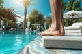 Beautifully groomed feet Poolside elegance, spa and travel concept