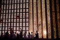 Beautifully Illuminated Mosque During Muharram with Worshippers in Prayer - Generative AI