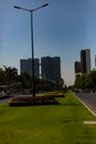 Beautifully landscaped traffic island between the busy roads of Phnom Penh, Cambodia Royalty Free Stock Photo