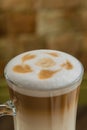 Beautifully made coffee latte with pattern on froth.