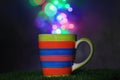 Beautifully patterned ceramic mug with bokeh