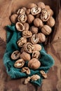 Beautifully presented walnuts on rusty wood table