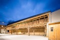 Beautifully renovated old farm with half-timbering in the evening