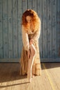 Beautifully sensual girl with long cascading wavy red hair with stockings Royalty Free Stock Photo