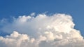 Beautifully shaped clouds in a bright blue sky Royalty Free Stock Photo