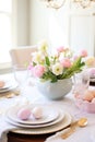 A beautifully styled Easter table setting with a floral centerpiece