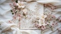 A beautifully styled elegant wedding invitation set on a pristine surface, surrounded subtle floral arrangements. Celebration