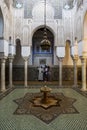 The beautifully tiled interior and fountain of one of the courts in the Mausoleum of Moulay Ismail in Meknes, Morocco.