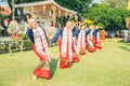 Beautifully women wear traditional clothes dancing in a unique manner of northern Thai style in order to worship and sacred city