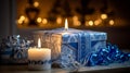 Hanukkah Gift Box with Blue and Silver Ribbon and Lit Candles on Cozy Mantle