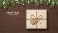 Rustic Gift Box with Bow and Heart on Wooden Surface Royalty Free Stock Photo