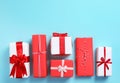 Beautifully wrapped gift boxes on color background Royalty Free Stock Photo