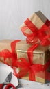 Beautifully wrapped gift boxes on white table, closeup Royalty Free Stock Photo