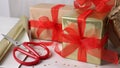 Beautifully wrapped gift boxes on white table, closeup Royalty Free Stock Photo