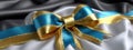 A beautifully wrapped present features a shiny blue and gold ribbon, adding a touch of elegance. The soft folds of Royalty Free Stock Photo
