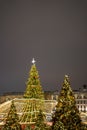 Beautifuly decorated Christmas tree in the city at night