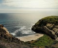 A beautiul beach surrounded by cliffs