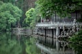 peaceful lake with trees and chinese garden Royalty Free Stock Photo