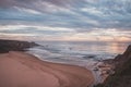 Beauty of the Algarve Atlantic coast in western Portugal. Odeceixe beach under sunset light. Following the Fisherman trail. A Royalty Free Stock Photo