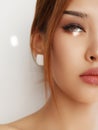 Beauty asian girl with creative make-up. Portrait of young beautiful asian girl with smoky eye makeup Royalty Free Stock Photo