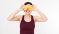 Beauty asian japanese woman hold Oranges.Beauty concept. Beautiful Joyful teen girl with freckles, funny red hairstyle and yellow Royalty Free Stock Photo