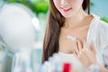 Woman apply sunscreen or lotion Royalty Free Stock Photo