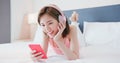 Woman enjoy music by smartphone