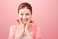 Beauty Asian Young Portrait. Beautiful Spa Woman Touching her Fa Royalty Free Stock Photo