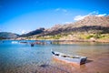 Beauty Atlantic coast with fishing boats, beach, ocean, village, mountains and sky with clouds. Galicia, Spain Royalty Free Stock Photo