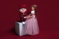 The beauty ballerina who holding a nutcracker Royalty Free Stock Photo