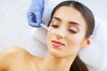 Beauty. Beautiful Woman in Beauty Salon. Relax and Lying on the Massage Tables. Clean and Fresh Skin. High Resolution