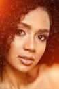 Beauty black skin woman African Ethnic female face. Young african american model with long afro hair. Lux model Royalty Free Stock Photo