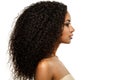 Beauty black skin woman African Ethnic female face. Young african american model with long afro hair. Lux model in profile Royalty Free Stock Photo